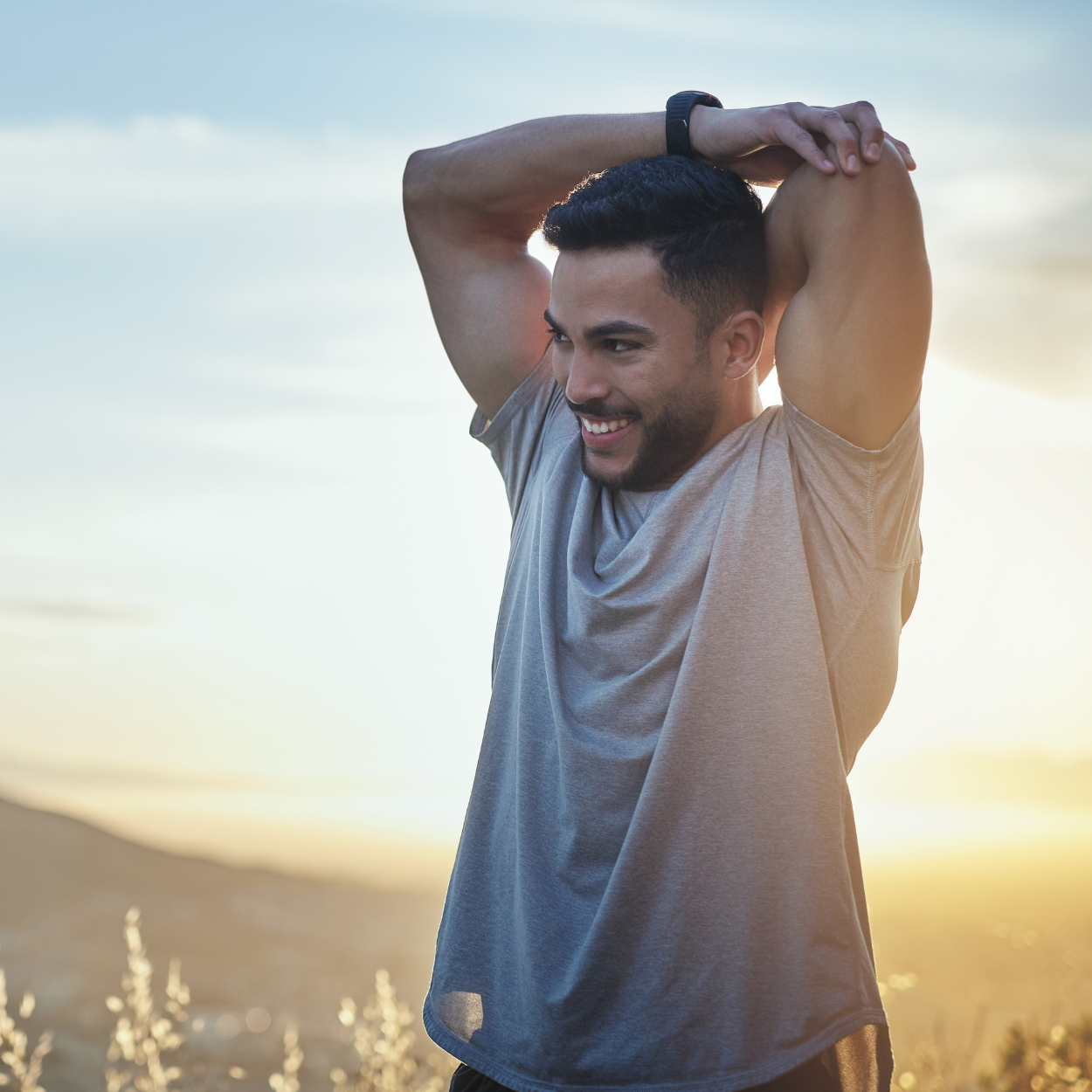 IV Vitamin Infusions Sq Person stretching outdoors at sunset, embodying energy, recovery, and holistic wellness supported by IV Vitamin Infusions for hydration, immunity, and performance.