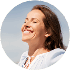Ketamine IV Therapy Circle Image Peaceful woman in light blue blouse under a clear sky, representing rapid relief and emotional clarity from Ketamine IV Therapy for treatment-resistant depression, anxiety, and PTSD.